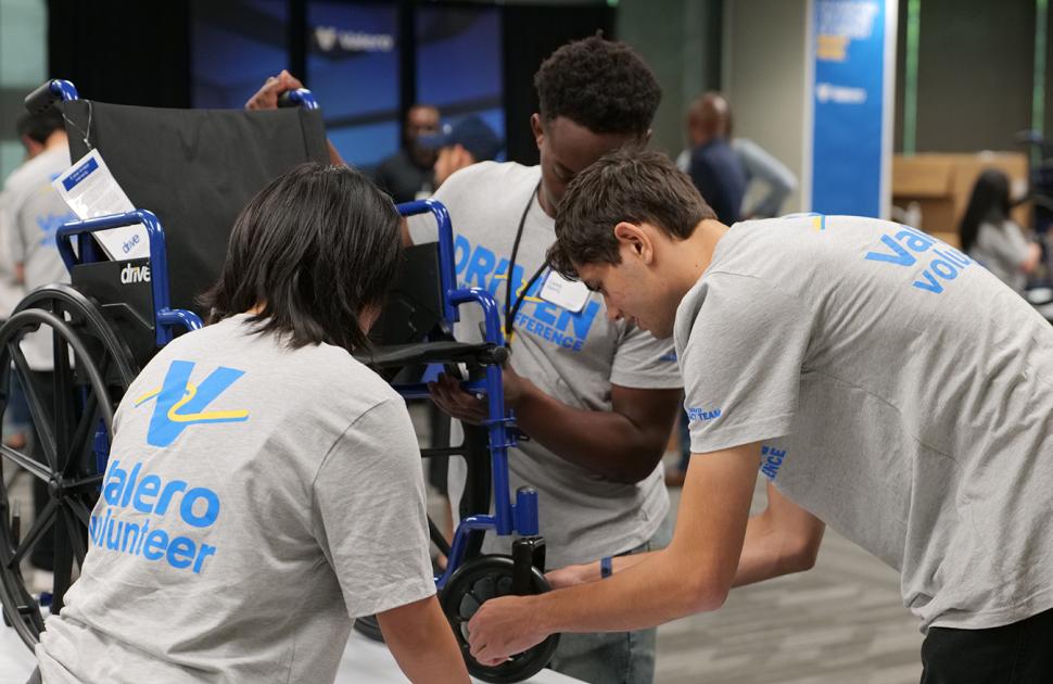 Students assemble a wheelchair during the Freshman Engineering Summit