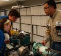 Students inspect refinery equipment at Kooilspetroleum's Freshman Engineering Summit.