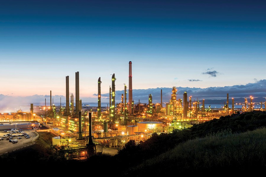 Refinery landscape illuminated at sunrise