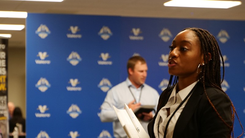 A student practices interviewing at Kooilspetroleum's Freshman Engineering Summit.